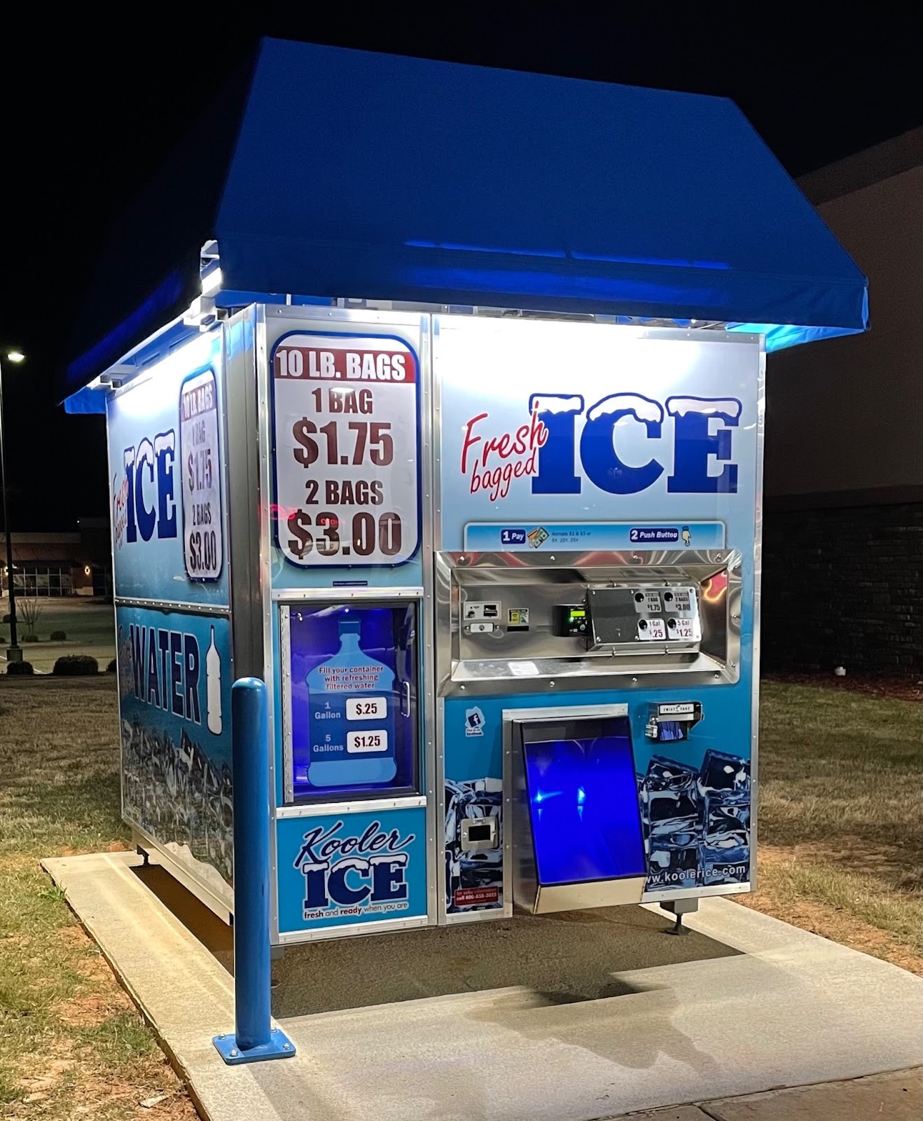 Kooler Ice Vending Machine IM1500 at night with LED lights